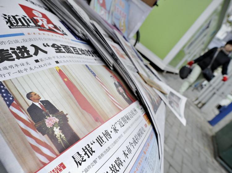 <a><img src="https://www.theepochtimes.com/assets/uploads/2015/09/obama-china-93168111-small.jpg" alt="A woman (R) walks past a news stand in Shanghai where Chinese newspapers reporting US President Barack Obama's visit to China are displayed on November 18, 2009. (Philippe Lopez/AFP/Getty Images)" title="A woman (R) walks past a news stand in Shanghai where Chinese newspapers reporting US President Barack Obama's visit to China are displayed on November 18, 2009. (Philippe Lopez/AFP/Getty Images)" width="320" class="size-medium wp-image-1825176"/></a>