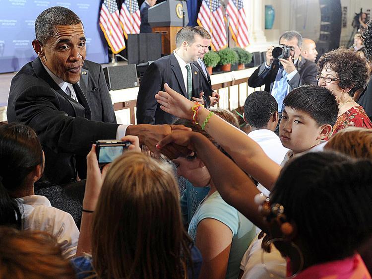 <a><img src="https://www.theepochtimes.com/assets/uploads/2015/09/obobo104106152.jpg" alt="President Barack Obama shakes hands with students after his second annual Back-to-School speech on September 14, 2010 at the Julia R. Masterman Laboratory and Demonstration School in Philadelphia, Pennsylvania. (Tim Sloan/AFP/Getty Images)" title="President Barack Obama shakes hands with students after his second annual Back-to-School speech on September 14, 2010 at the Julia R. Masterman Laboratory and Demonstration School in Philadelphia, Pennsylvania. (Tim Sloan/AFP/Getty Images)" width="320" class="size-medium wp-image-1814164"/></a>