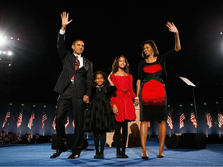 <a><img src="https://www.theepochtimes.com/assets/uploads/2015/09/obobo83565928.jpg" alt="U.S. President elect Barack Obama stands on stage along with his wife Michelle and daughters Malia (red dress) and Sasha (black dress) during an election night gathering in Grant Park on November 4, 2008 in Chicago, Illinois.    (Joe Raedle/Getty Images)" title="U.S. President elect Barack Obama stands on stage along with his wife Michelle and daughters Malia (red dress) and Sasha (black dress) during an election night gathering in Grant Park on November 4, 2008 in Chicago, Illinois.    (Joe Raedle/Getty Images)" width="320" class="size-medium wp-image-1833047"/></a>