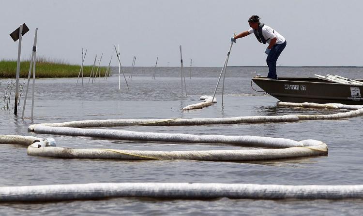 <a><img src="https://www.theepochtimes.com/assets/uploads/2015/09/oil-boom-102983028.jpg" alt="A worker makes adjustments to oil boom July 19 near Pointe Aux Chenes, La. The Pointe-au-Chien Indian tribe has lived along the threatened marshes for more than 100 years and make their livelihood on the water. (Mario Tama/Getty Images)" title="A worker makes adjustments to oil boom July 19 near Pointe Aux Chenes, La. The Pointe-au-Chien Indian tribe has lived along the threatened marshes for more than 100 years and make their livelihood on the water. (Mario Tama/Getty Images)" width="320" class="size-medium wp-image-1812832"/></a>