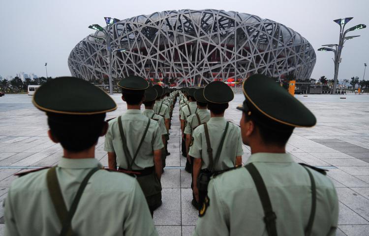<a><img src="https://www.theepochtimes.com/assets/uploads/2015/09/olympics_military_82043754.jpg" alt="Chinese paramilitary soldiers rehears their security drills outside the main Olympic Stadium, also known as the Bird's Nest. (Frederick J. Brown/AFP/Getty Images)" title="Chinese paramilitary soldiers rehears their security drills outside the main Olympic Stadium, also known as the Bird's Nest. (Frederick J. Brown/AFP/Getty Images)" width="320" class="size-medium wp-image-1834719"/></a>