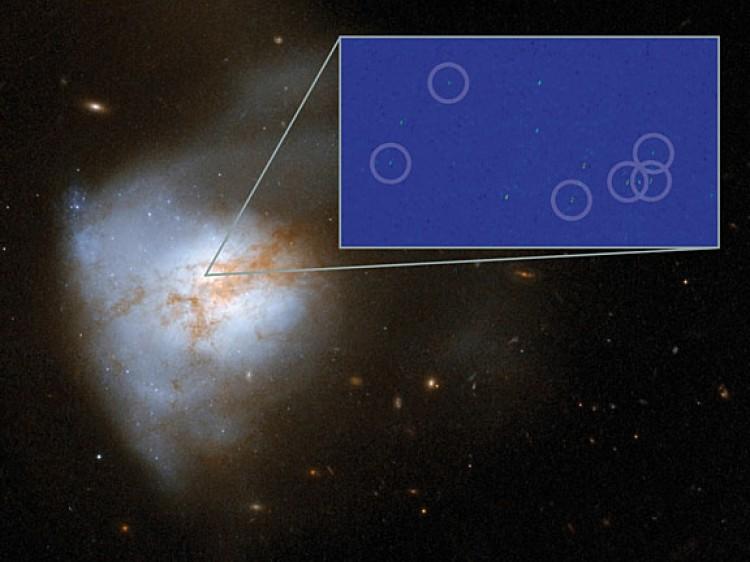 <a><img src="https://www.theepochtimes.com/assets/uploads/2015/09/ooarp220_hst_vlbi_full.jpeg" alt="Galaxy Arp 220 (main image, taken with the Hubble Space Telescope) with some of its newly discovered supernovae (inset, taken with Global VLBI). The inset image is 250 light years across. (NASA, ESA, Hubble Heritage Team, Chalmers )" title="Galaxy Arp 220 (main image, taken with the Hubble Space Telescope) with some of its newly discovered supernovae (inset, taken with Global VLBI). The inset image is 250 light years across. (NASA, ESA, Hubble Heritage Team, Chalmers )" width="320" class="size-medium wp-image-1797036"/></a>