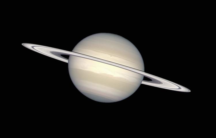 <a><img class="size-full wp-image-1789089" title="Saturn In Natural Colors, as taken by the Hubble Space Telescope. The ring swirling around Saturn consists of chunks of ice and dust. Saturn itself is made of ammonia ice and methane gas. The little dark spot on Saturn is the shadow from Saturn's moon Enceladus. (Hubble Heritage Team (AURA/STScI/NASA/ESA))" src="https://www.theepochtimes.com/assets/uploads/2015/09/opo9828c.jpg" alt="Saturn In Natural Colors, as taken by the Hubble Space Telescope. The ring swirling around Saturn consists of chunks of ice and dust. Saturn itself is made of ammonia ice and methane gas. The little dark spot on Saturn is the shadow from Saturn's moon Enceladus. (Hubble Heritage Team (AURA/STScI/NASA/ESA))" width="750" height="481"/></a>