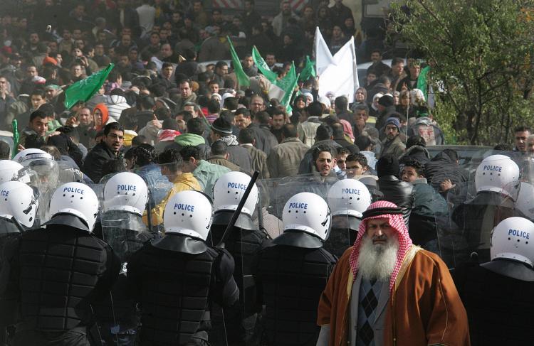 <a><img src="https://www.theepochtimes.com/assets/uploads/2015/09/palz84158389.jpg" alt="Palestinian security forces keep watch during a Hamas demonstration in the West Bank city of Hebron on January 02, 2009. Thousands of Palestinians held angry protests after Hamas called for a 'day of wrath' against Israel's Gaza campaign.    (Hazem Bader/AFP/Getty Images)" title="Palestinian security forces keep watch during a Hamas demonstration in the West Bank city of Hebron on January 02, 2009. Thousands of Palestinians held angry protests after Hamas called for a 'day of wrath' against Israel's Gaza campaign.    (Hazem Bader/AFP/Getty Images)" width="320" class="size-medium wp-image-1831809"/></a>