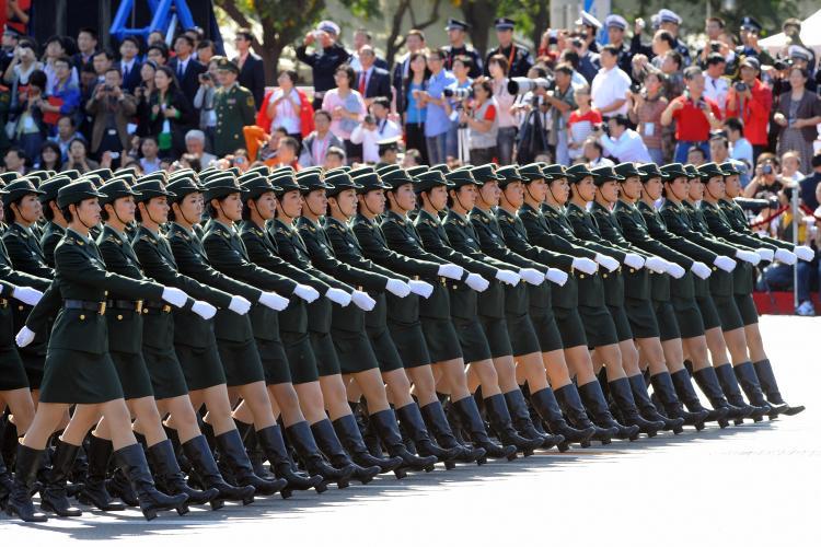 <a><img src="https://www.theepochtimes.com/assets/uploads/2015/09/parade-91297647.jpg" alt="Chinese People's Liberation Army (PLA) women soldiers march past during the National Day parade in Beijing on October 1, 2009. (Goh Chai Hin/AFP/Getty Images)" title="Chinese People's Liberation Army (PLA) women soldiers march past during the National Day parade in Beijing on October 1, 2009. (Goh Chai Hin/AFP/Getty Images)" width="320" class="size-medium wp-image-1825761"/></a>