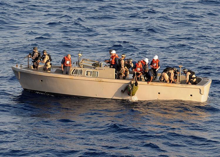 <a><img src="https://www.theepochtimes.com/assets/uploads/2015/09/pirates98371540.jpg" alt="US military team pulls suspected Somali pirates from the sea for transport back to the ship USS Ashland (LSD 48) on April 10, in the Gulf of Aden.  (Communication Specialist 2nd Class Jason R. Zalasky/U.S. Navy via Getty Images)" title="US military team pulls suspected Somali pirates from the sea for transport back to the ship USS Ashland (LSD 48) on April 10, in the Gulf of Aden.  (Communication Specialist 2nd Class Jason R. Zalasky/U.S. Navy via Getty Images)" width="320" class="size-medium wp-image-1819063"/></a>