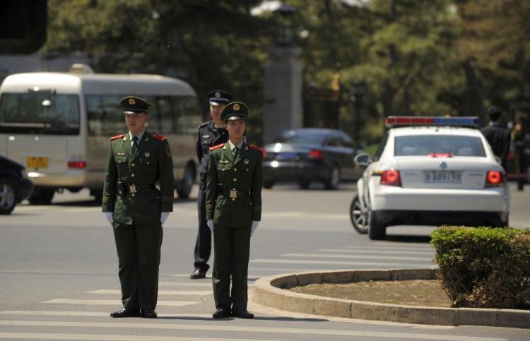 <a><img src="https://www.theepochtimes.com/assets/uploads/2015/09/police98877733.jpg" alt="Police stand guard as a diplomatic motorcade enters the Diaoyutai State guest house in Beijing on May 6, 2010. North Korean leader, Kim Jong-Il, along with his 17-car luxury motorcade, made his fifth visit to China from May 3 to May 7. (Peter Parks/AFP/Getty Images)" title="Police stand guard as a diplomatic motorcade enters the Diaoyutai State guest house in Beijing on May 6, 2010. North Korean leader, Kim Jong-Il, along with his 17-car luxury motorcade, made his fifth visit to China from May 3 to May 7. (Peter Parks/AFP/Getty Images)" width="320" class="size-medium wp-image-1819879"/></a>