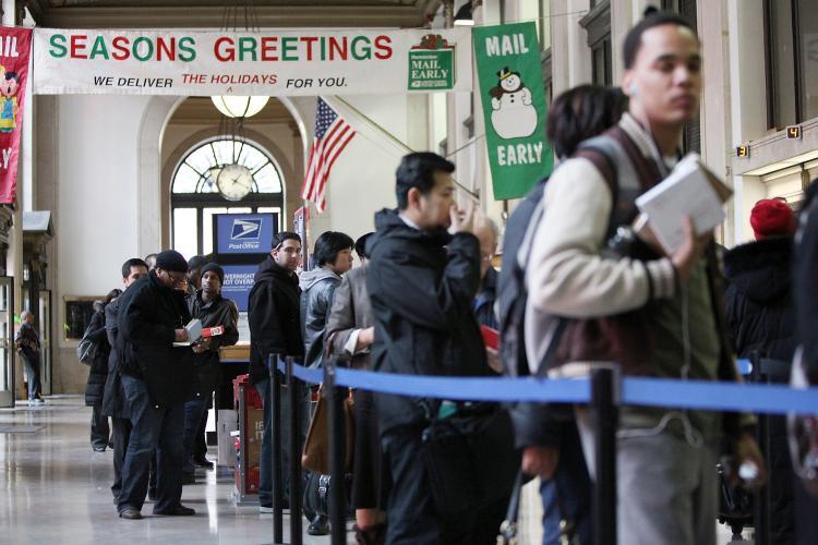 <a><img src="https://www.theepochtimes.com/assets/uploads/2015/09/post-office.jpg" alt="People wait in line to mail packages and letters at the James A. Farley Post Office building on the busiest day of the year at the post office, Dec. 14, 2009, in New York City. (Mario Tama/Getty Images)" title="People wait in line to mail packages and letters at the James A. Farley Post Office building on the busiest day of the year at the post office, Dec. 14, 2009, in New York City. (Mario Tama/Getty Images)" width="320" class="size-medium wp-image-1824548"/></a>