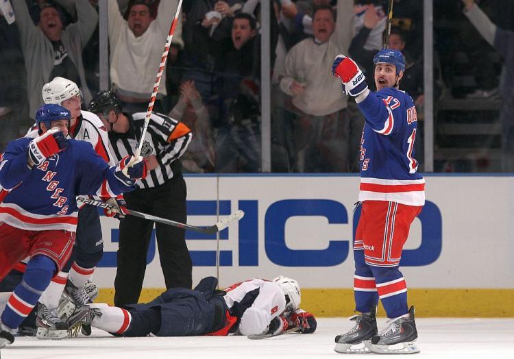 <a><img src="https://www.theepochtimes.com/assets/uploads/2015/09/rangers.jpg" alt="STUNNING: Rangers' center Brandon Dubinsky (right) celebrates after scoring the game winner that defeated the Washington Capitals 3-2 in Game 3 at Madison Square Garden on Sunday. (Bruce Bennett/Getty Images)" title="STUNNING: Rangers' center Brandon Dubinsky (right) celebrates after scoring the game winner that defeated the Washington Capitals 3-2 in Game 3 at Madison Square Garden on Sunday. (Bruce Bennett/Getty Images)" width="320" class="size-medium wp-image-1805414"/></a>