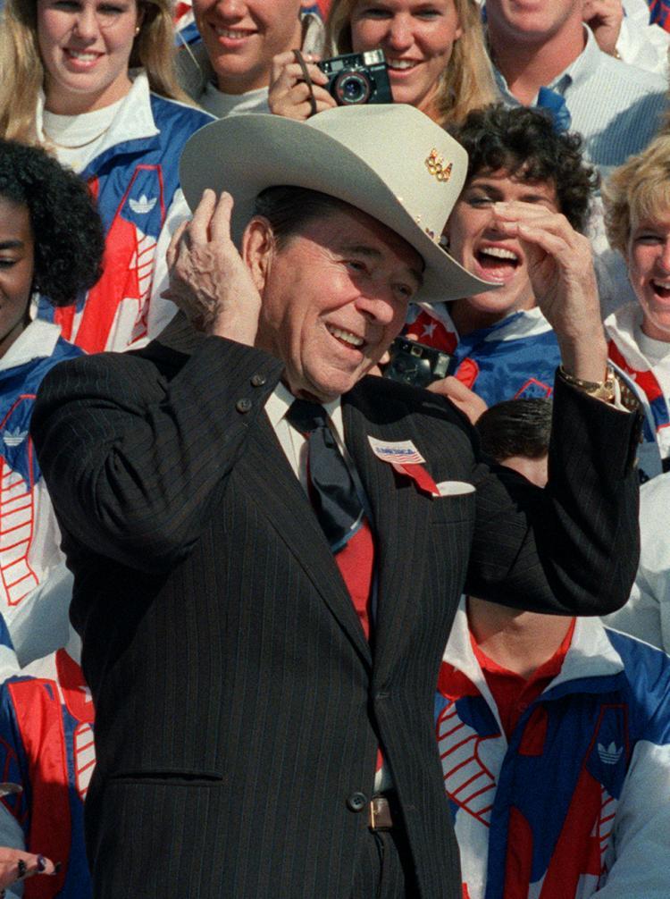 <a><img src="https://www.theepochtimes.com/assets/uploads/2015/09/reagan_107832887.jpg" alt="THE GIPPER: President Ronald Reagan tries on an Olympic cowboy hat on the South Lawn of the White House in Oct. 1988 during a ceremony honoring the U.S. Olympic team.  (Mike Sargent/Getty Images )" title="THE GIPPER: President Ronald Reagan tries on an Olympic cowboy hat on the South Lawn of the White House in Oct. 1988 during a ceremony honoring the U.S. Olympic team.  (Mike Sargent/Getty Images )" width="320" class="size-medium wp-image-1808531"/></a>