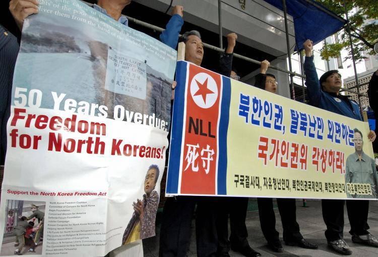<a><img src="https://www.theepochtimes.com/assets/uploads/2015/09/regime-77391700.jpg" alt="South Korean conservative activists stage an anti-North korea rally outside a state human rights committee in Seoul, 18 October 2007, denouncing human rights abuses in North Korea. (Jung Yeon-Je/AFP/Getty Images)" title="South Korean conservative activists stage an anti-North korea rally outside a state human rights committee in Seoul, 18 October 2007, denouncing human rights abuses in North Korea. (Jung Yeon-Je/AFP/Getty Images)" width="320" class="size-medium wp-image-1826739"/></a>
