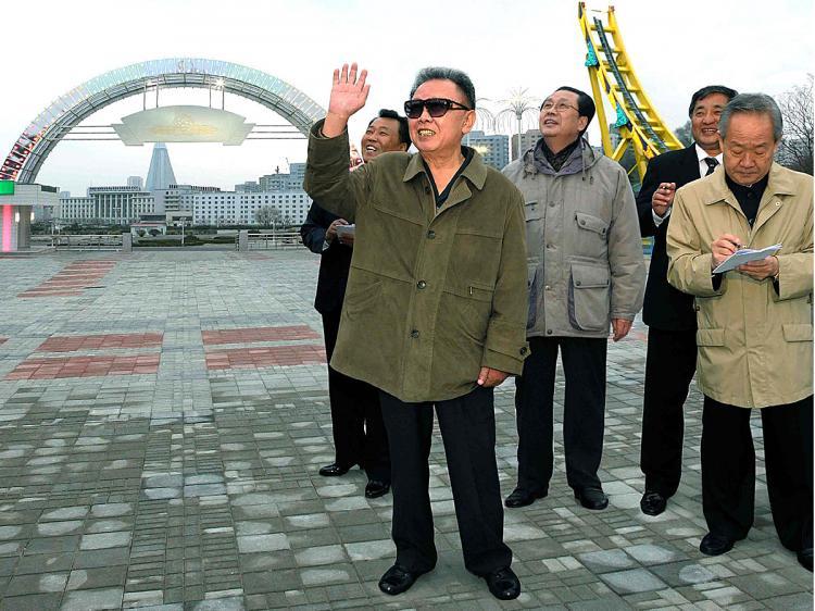 <a><img src="https://www.theepochtimes.com/assets/uploads/2015/09/ronry98627584.jpg" alt="This picture, released from North Korea's official Korean Central News Agency on April 23, 2010, shows North Korean leader Kim Jong Il inspecting Pyongyang's Kaeson Youth Park. (KNS/AFP/Getty Images)" title="This picture, released from North Korea's official Korean Central News Agency on April 23, 2010, shows North Korean leader Kim Jong Il inspecting Pyongyang's Kaeson Youth Park. (KNS/AFP/Getty Images)" width="320" class="size-medium wp-image-1820362"/></a>