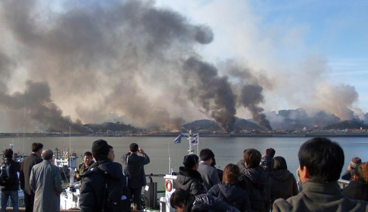 <a><img src="https://www.theepochtimes.com/assets/uploads/2015/09/smoke107400922.jpg" alt="This picture taken on Nov. 23, 2010, by a South Korean tourist shows huge plumes of smoke rising from South Korea's Yeonpyeong Island due to an artillery attack from North Korea. (STR/AFP/Getty Images)" title="This picture taken on Nov. 23, 2010, by a South Korean tourist shows huge plumes of smoke rising from South Korea's Yeonpyeong Island due to an artillery attack from North Korea. (STR/AFP/Getty Images)" width="320" class="size-medium wp-image-1810955"/></a>