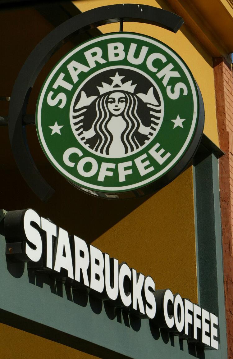 <a><img src="https://www.theepochtimes.com/assets/uploads/2015/09/starbucks_82102560.jpg" alt="DISMAL REPORTS: Signs are seen in the front of a Starbucks coffee shop January 22, 2004 in San Francisco, California. In an effort to cut costs, the coffee chain announced July 29, 2008 that it was laying off 1000 non-store employees. (Justin Sullivan/Getty Images)" title="DISMAL REPORTS: Signs are seen in the front of a Starbucks coffee shop January 22, 2004 in San Francisco, California. In an effort to cut costs, the coffee chain announced July 29, 2008 that it was laying off 1000 non-store employees. (Justin Sullivan/Getty Images)" width="320" class="size-medium wp-image-1830907"/></a>
