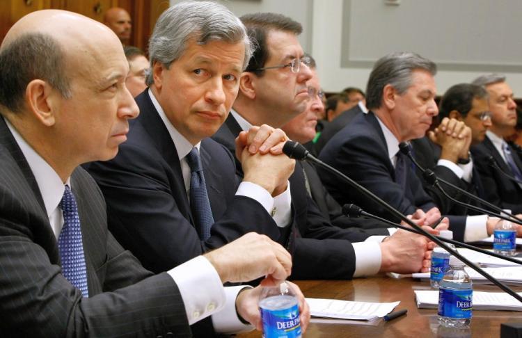 <a><img src="https://www.theepochtimes.com/assets/uploads/2015/09/tarp84740181.jpg" alt="In this file photo from 2009, executives from the financial institutions who received TARP funds, (L-R) Goldman Sachs CEO Lloyd Blankfein, JPMorgan Chase & Co. CEO Jamie Dimon, The Bank of New York Mellon CEO Robert P. Kelly, former Bank of America CEO Ken Lewis, State Street Corporation Chairman Ronald Logue, Citigroup CEO Vikram Pandit, and Wells Fargo President John Stumpf testify before Congress. (Chip Somodevilla/Getty Images )" title="In this file photo from 2009, executives from the financial institutions who received TARP funds, (L-R) Goldman Sachs CEO Lloyd Blankfein, JPMorgan Chase & Co. CEO Jamie Dimon, The Bank of New York Mellon CEO Robert P. Kelly, former Bank of America CEO Ken Lewis, State Street Corporation Chairman Ronald Logue, Citigroup CEO Vikram Pandit, and Wells Fargo President John Stumpf testify before Congress. (Chip Somodevilla/Getty Images )" width="320" class="size-medium wp-image-1813958"/></a>