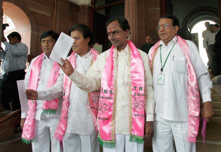 <a><img src="https://www.theepochtimes.com/assets/uploads/2015/09/telangia80086497.jpg" alt="Telangana Rashtra Samithi (TRS) Chief K. Chandrasekhar Rao (second from right) along with the TRS's other three members of Parliament show their resignation letters as they enter the parliament house in New Delhi in this file photo from March 2008. Rao is in stable condition after an 11-day hunger strike to as part of a campaign for a separate of a Telangana state. (Prakash Singh/AFP/Getty Images)" title="Telangana Rashtra Samithi (TRS) Chief K. Chandrasekhar Rao (second from right) along with the TRS's other three members of Parliament show their resignation letters as they enter the parliament house in New Delhi in this file photo from March 2008. Rao is in stable condition after an 11-day hunger strike to as part of a campaign for a separate of a Telangana state. (Prakash Singh/AFP/Getty Images)" width="320" class="size-medium wp-image-1824730"/></a>