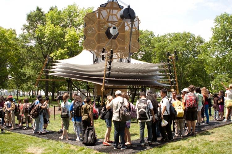 <a><img src="https://www.theepochtimes.com/assets/uploads/2015/09/telescope.jpg" alt="New York City school students stand in front of the James Webb Space Telescope model, which launched the World Science Festival at Battery Park this Tuesday. (Henry Lam/ Epoch Times Staff)" title="New York City school students stand in front of the James Webb Space Telescope model, which launched the World Science Festival at Battery Park this Tuesday. (Henry Lam/ Epoch Times Staff)" width="320" class="size-medium wp-image-1819163"/></a>