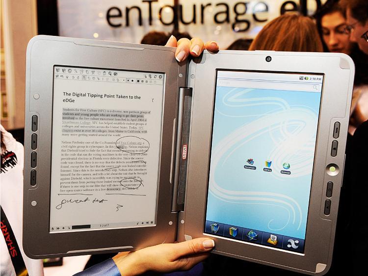 <a><img src="https://www.theepochtimes.com/assets/uploads/2015/09/textxtx95629135.jpg" alt="Textbook of the future? The enTourage eDGe e-book is displayed at the 2010 International Consumer Electronics Show at the Las Vegas Convention Center January 7, 2010 in Las Vegas, Nevada. (Ethan Miller/Getty Images)" title="Textbook of the future? The enTourage eDGe e-book is displayed at the 2010 International Consumer Electronics Show at the Las Vegas Convention Center January 7, 2010 in Las Vegas, Nevada. (Ethan Miller/Getty Images)" width="320" class="size-medium wp-image-1821995"/></a>