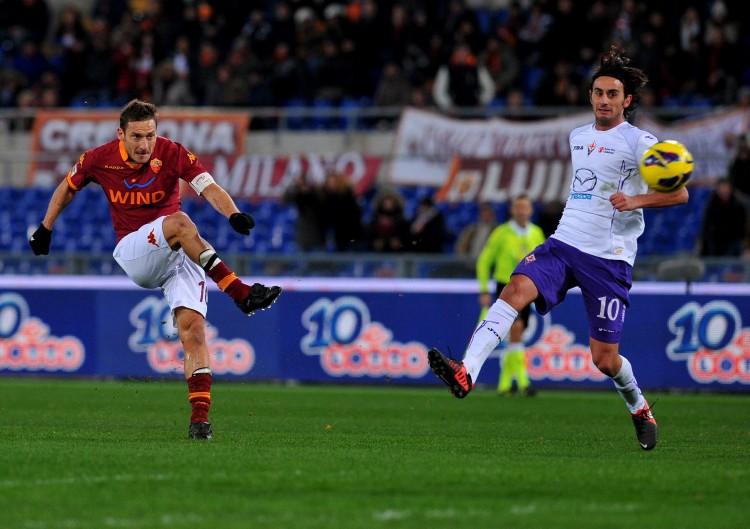 <a><img class="size-full wp-image-1773673" title="FBL-ITA-SERIEA-ROMA-FIORENTINA" src="https://www.theepochtimes.com/assets/uploads/2015/09/totti158009106.jpg" alt="AS Roma forward Francesco Totti scores against Fiorentina in Saturday's Serie A action at the Stadio Olimpico. (Tiziana Fabi/AFP/Getty Images) " width="750" height="529"/></a>