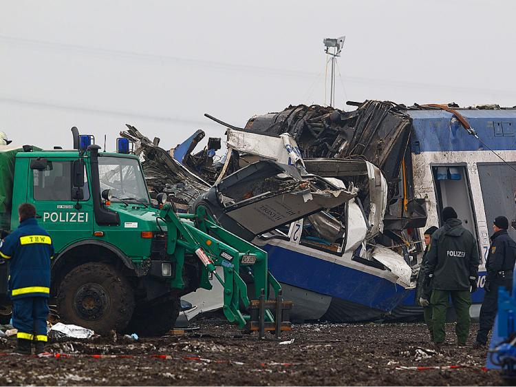 <a><img src="https://www.theepochtimes.com/assets/uploads/2015/09/traion108617648.jpg" alt="Emergency staff work at the scene of an accident where a passenger train collided head on with a goods train on January 30, 2011 in Hordorf near Oschersleben, Germany. (Marco Prosch/Getty Images)" title="Emergency staff work at the scene of an accident where a passenger train collided head on with a goods train on January 30, 2011 in Hordorf near Oschersleben, Germany. (Marco Prosch/Getty Images)" width="320" class="size-medium wp-image-1809033"/></a>