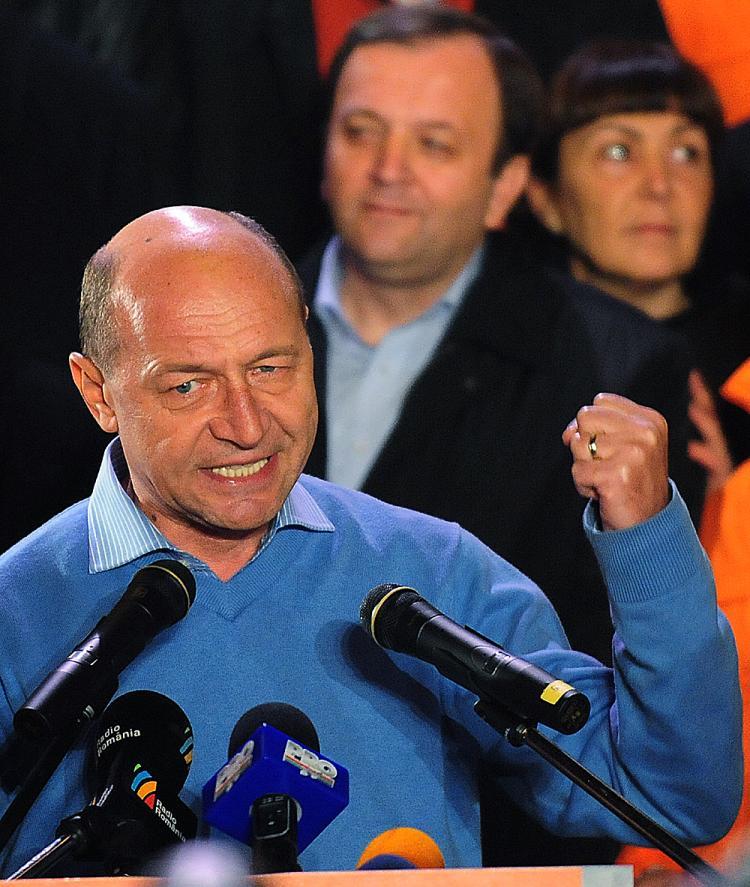 <a><img src="https://www.theepochtimes.com/assets/uploads/2015/09/trajan94077273.jpg" alt="WINNER: Romania incumbent President Traian Basescu addresses supporters at Democratic-Liberal Party's headquarters after declaring himself the winner on Dec. 6 in Bucharest. (Daniel Mihailescu/AFP/Getty Images)" title="WINNER: Romania incumbent President Traian Basescu addresses supporters at Democratic-Liberal Party's headquarters after declaring himself the winner on Dec. 6 in Bucharest. (Daniel Mihailescu/AFP/Getty Images)" width="320" class="size-medium wp-image-1824841"/></a>
