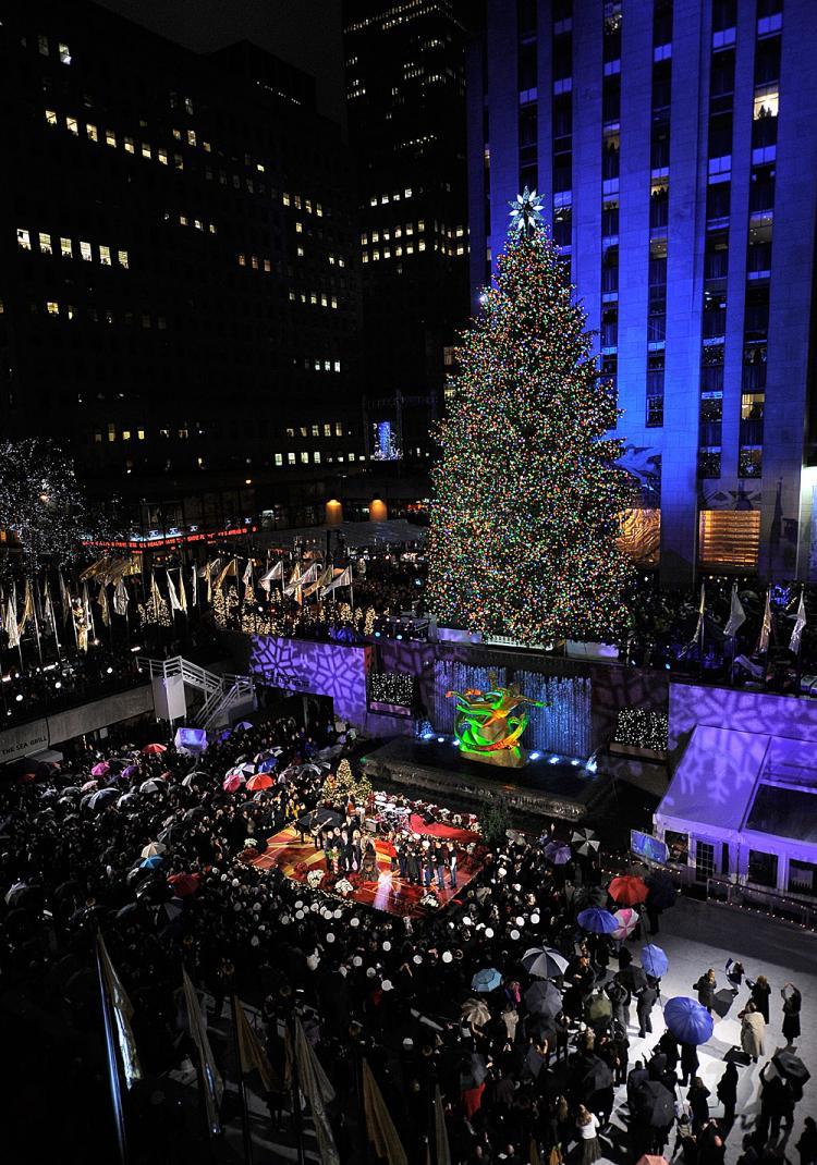 <a><img src="https://www.theepochtimes.com/assets/uploads/2015/09/treburning93615858.jpg" alt="The Rockefeller Center Christmas Tree after the lighting ceremony at the Rockefeller Center Christmas tree lighting at Rockefeller Center on December 2, 2009 in New York City. (Jemal Countess/Getty Images)" title="The Rockefeller Center Christmas Tree after the lighting ceremony at the Rockefeller Center Christmas tree lighting at Rockefeller Center on December 2, 2009 in New York City. (Jemal Countess/Getty Images)" width="320" class="size-medium wp-image-1811619"/></a>