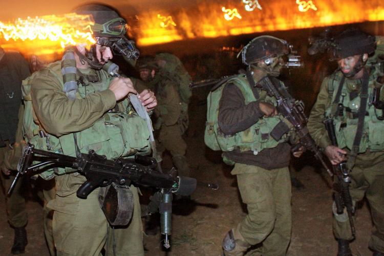<a><img src="https://www.theepochtimes.com/assets/uploads/2015/09/troops84164732b.jpg" alt="Israeli Defense Force troops mobilize on January 3, 2009 on the Gaza/Israel border. (Uriel Sinai/Getty Images)" title="Israeli Defense Force troops mobilize on January 3, 2009 on the Gaza/Israel border. (Uriel Sinai/Getty Images)" width="320" class="size-medium wp-image-1831785"/></a>