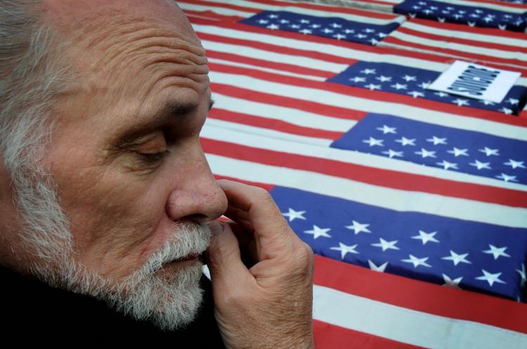 <a><img src="https://www.theepochtimes.com/assets/uploads/2015/09/war-85551130.jpg" alt="Vietnam War veteran and author of the book 'Born on the Fourth of July' Ron Kovic reacts in front of mock coffins during a protest to mark the sixth anniversary of the Iraq war in Hollywood on March 21, 2009. (Mark Ralston/AFP/Getty Images)" title="Vietnam War veteran and author of the book 'Born on the Fourth of July' Ron Kovic reacts in front of mock coffins during a protest to mark the sixth anniversary of the Iraq war in Hollywood on March 21, 2009. (Mark Ralston/AFP/Getty Images)" width="320" class="size-medium wp-image-1825310"/></a>