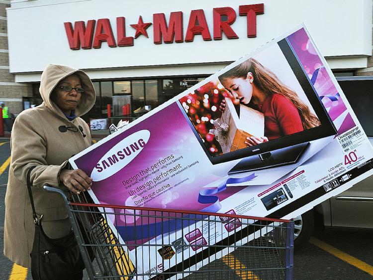 <a><img src="https://www.theepochtimes.com/assets/uploads/2015/09/wlamrta93448849.jpg" alt="Holiday shoppers will be buying up large on the day after Christmas. Big retailers like Wal-Mart will be hoping that pockets are deep. (Paul J. Richards/AFP/Getty Images )" title="Holiday shoppers will be buying up large on the day after Christmas. Big retailers like Wal-Mart will be hoping that pockets are deep. (Paul J. Richards/AFP/Getty Images )" width="320" class="size-medium wp-image-1824492"/></a>