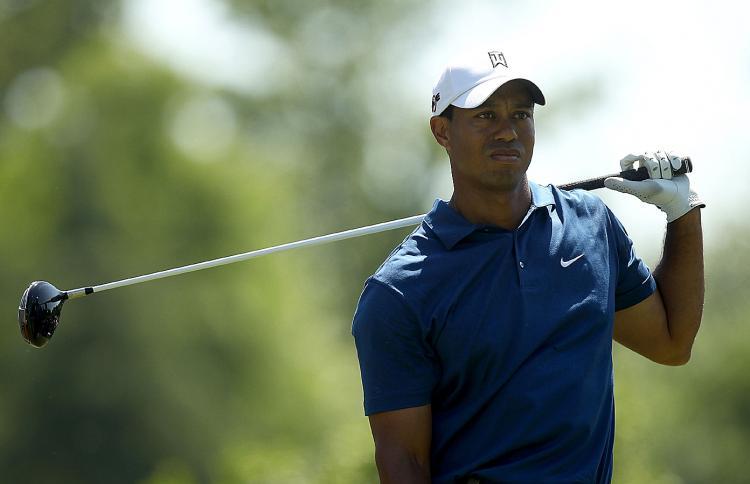 <a><img src="https://www.theepochtimes.com/assets/uploads/2015/09/wuuudz98769654.jpg" alt="DISMAYED, REJECTED: Tiger Woods reacts to a poor tee shot on the 9th hole during the second round of the Quail Hollow Championship. (Streeter Lecka/Getty Images)" title="DISMAYED, REJECTED: Tiger Woods reacts to a poor tee shot on the 9th hole during the second round of the Quail Hollow Championship. (Streeter Lecka/Getty Images)" width="320" class="size-medium wp-image-1820382"/></a>