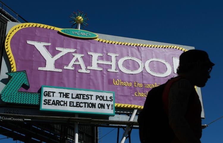 <a><img src="https://www.theepochtimes.com/assets/uploads/2015/09/yahoo_83374118.jpg" alt="A pedestrian walks by a Yahoo billboard October 21, 2008 in San Francisco, California. Yahoo reported a fourth-quarter loss of $303 million as CEO Jerry Yang exited after a tumultuous tenure as CEO. (Justin Sullivan/Getty Images)" title="A pedestrian walks by a Yahoo billboard October 21, 2008 in San Francisco, California. Yahoo reported a fourth-quarter loss of $303 million as CEO Jerry Yang exited after a tumultuous tenure as CEO. (Justin Sullivan/Getty Images)" width="320" class="size-medium wp-image-1830961"/></a>