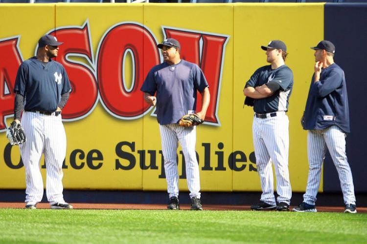 <a><img src="https://www.theepochtimes.com/assets/uploads/2015/09/yankees105209488.jpg" alt="Yankees bullpen coach Mike Harkey (center) has been getting starting pitchers CC Sabathia (L), Phil Hughes (second from right), and Andy Pettitte (R) ready for the ALCS against the Texas Rangers. (Andrew Burton/Getty Images)" title="Yankees bullpen coach Mike Harkey (center) has been getting starting pitchers CC Sabathia (L), Phil Hughes (second from right), and Andy Pettitte (R) ready for the ALCS against the Texas Rangers. (Andrew Burton/Getty Images)" width="320" class="size-medium wp-image-1813455"/></a>