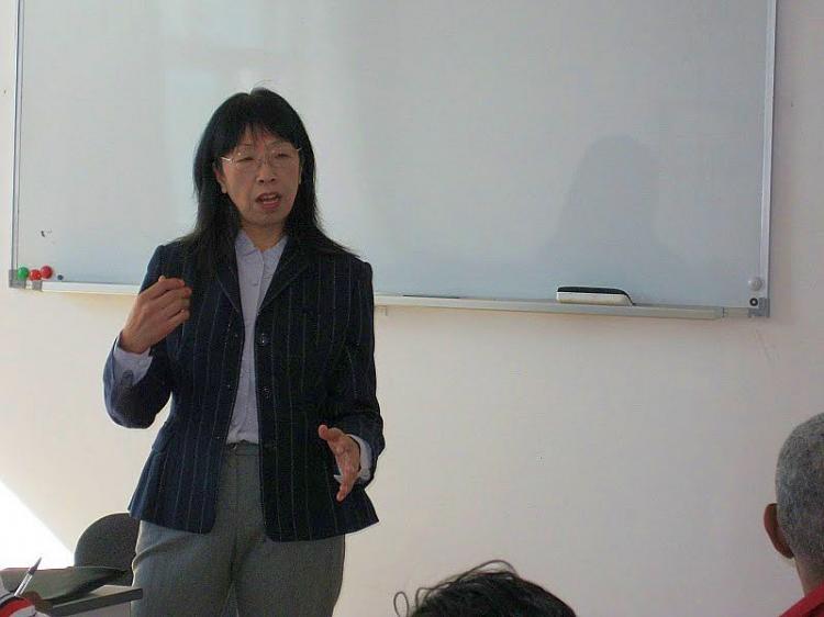 Professor Zhu Liqun, assistant president of the China Foreign Affairs University, spoke to Caribbean journalists on Oct. 13 last year. She said China is a developing country and it will be paying more attention to balancing the economy to help the people. (Courtesy of Gwyneth Harold)
