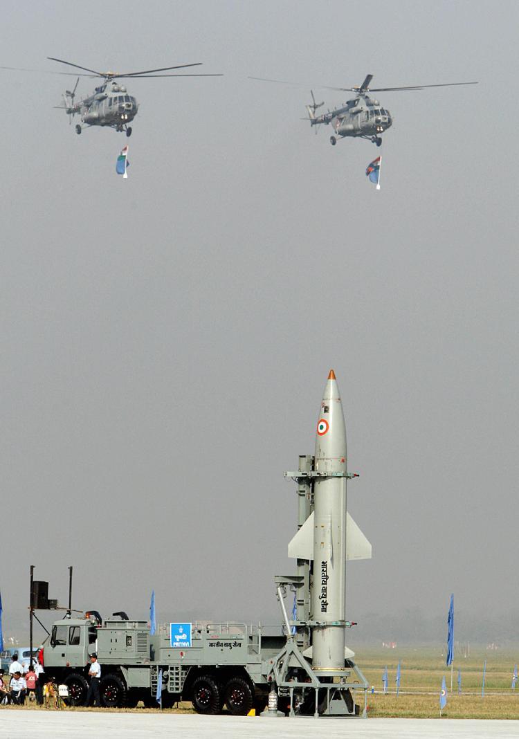<a><img src="https://www.theepochtimes.com/assets/uploads/2015/09/zzzindia83170857.jpg" alt="Indian Air Force's (IAF) helicopters fly past the Prithvi missile during the Air Force Day parade at the Air Force base at Hindon in Ghaziabad, near New Delhi.  (Prakash Singh/AFP/Getty Images)" title="Indian Air Force's (IAF) helicopters fly past the Prithvi missile during the Air Force Day parade at the Air Force base at Hindon in Ghaziabad, near New Delhi.  (Prakash Singh/AFP/Getty Images)" width="320" class="size-medium wp-image-1829689"/></a>