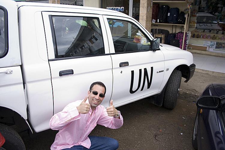 <a><img src="https://www.theepochtimes.com/assets/uploads/2015/09/zzzzzzzzmpi16.jpg" alt="SARCASM: Director Ami Horowitz documenting the U.N. presence in Cote d'Ivoire, Africa. (The Epoch Times )" title="SARCASM: Director Ami Horowitz documenting the U.N. presence in Cote d'Ivoire, Africa. (The Epoch Times )" width="320" class="size-medium wp-image-1830212"/></a>