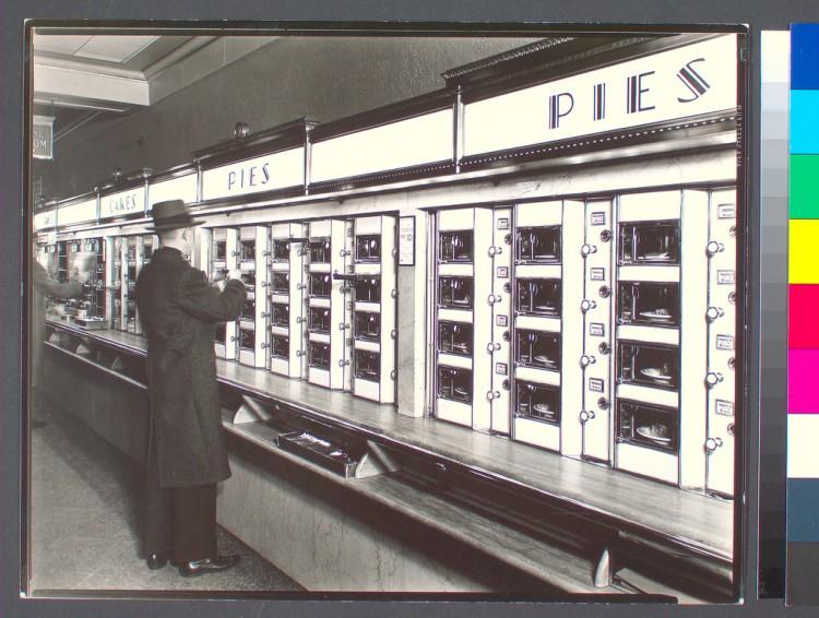 <a href="https://www.theepochtimes.com/assets/uploads/2015/10/historicalAutomat.jpg"><img class="size-large wp-image-1868656" title="Automat, 977 Eighth Avenue, Manhattan, 1936" src="https://www.theepochtimes.com/assets/uploads/2015/10/historicalAutomat.jpg" alt="Automat, 977 Eighth Avenue, Manhattan, 1936" width="590" height="445"/></a>