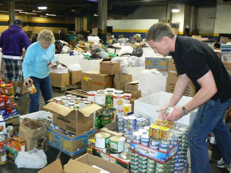 <a href="https://www.theepochtimes.com/assets/uploads/2015/10/packing3.jpg"><img src="https://www.theepochtimes.com/assets/uploads/2015/10/packing3.jpg" alt="Volunteers sort and pack goods at the warehouse in Tacoma on Friday. (Burke Long)" title="Volunteers sort and pack goods at the warehouse in Tacoma on Friday. (Burke Long)" width="575" class="size-medium wp-image-1870183"/></a>