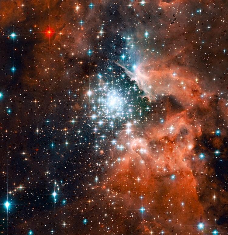 <a href="https://www.theepochtimes.com/assets/uploads/2015/10/sparkler.jpg"><img class="size-medium wp-image-1868938" title="SPARKLERS: Thousands of sparkling young stars nestled within the giant nebula NGC 3603 in the Carina spiral arm of the Milky Way, about 20,000 light-years away, like a starburst cluster. (NASA, ESA, and the Hubble Heritage)" src="https://www.theepochtimes.com/assets/uploads/2015/10/sparkler.jpg" alt="SPARKLERS: Thousands of sparkling young stars nestled within the giant nebula NGC 3603 in the Carina spiral arm of the Milky Way, about 20,000 light-years away, like a starburst cluster. (NASA, ESA, and the Hubble Heritage)" width="590"/></a>