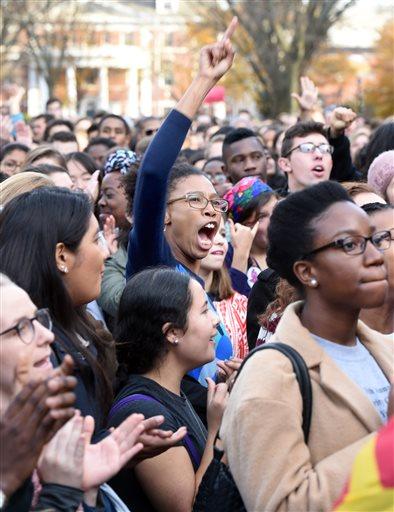 Yale University students and faculty rally to demand that Yale University become more inclusive to all students on Cross Campus in New Haven on Monday, Nov. 9, 2015. (Arnold Gold/New Haven Register via AP)