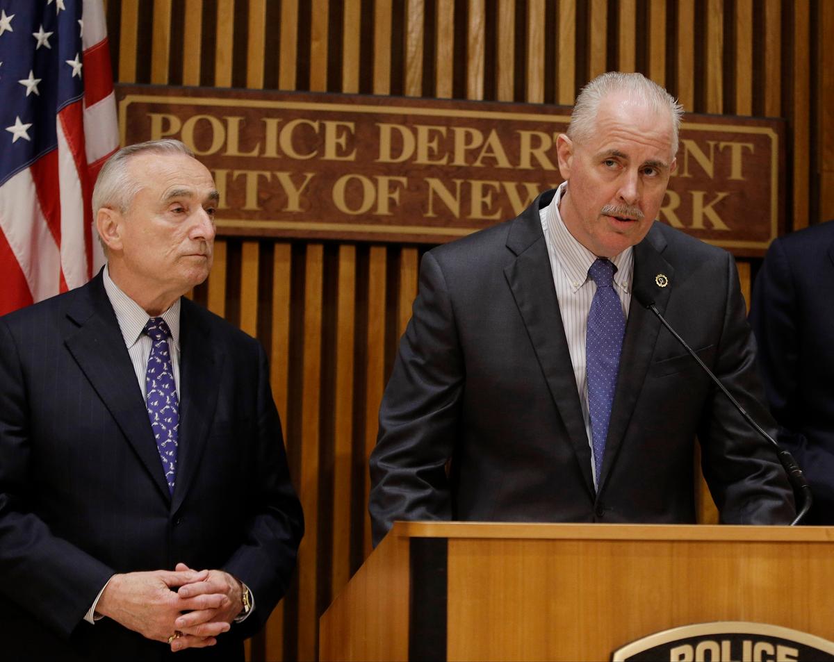 New York Police Chief of Detectives Robert Boyce speaks to the media as Police Commissioner William J. Bratton (l) looks on, in New York on June 4, 2014. (AP Photo/Frank Franklin II)