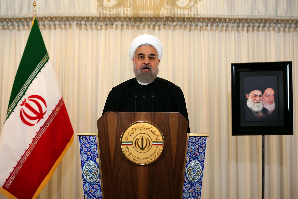Iranian President Hassan Rouhani at a press conference in his office in Tehran on Dec. 16, 2015. (Atta Kenare/AFP/Getty Images)