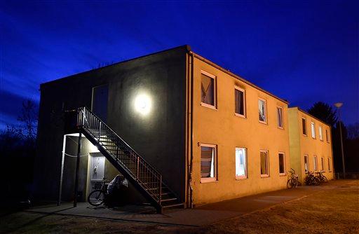 A migrant shelter is pictured in Kerpen, Germany, Monday evening, Jan. 18, 2016. A first suspect of the New Years Eve sexual assaults and robberies in Cologne from the Kerpen shelter was arrested over the weekend. (AP Photo/Martin Meissner)