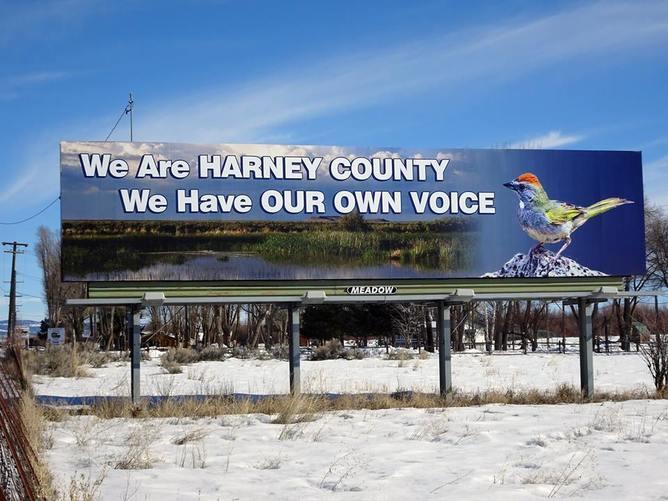A billboard in Harney County during the Malheur Occupation reflected most locals' unhappiness with the occupiers from outside the county. (Peter Walker)