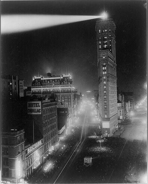 c.1908—Looking south down Broadway, nicknamed "the great white way," from 42nd Street, with crowds gathered to see films projected outdoors (Library of Congress)