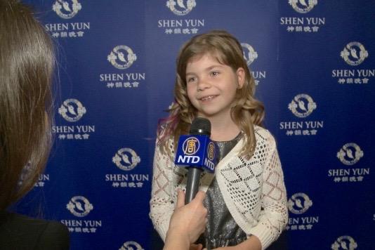 Emma Holzleitner was immersed in the Shen Yun Orchestra music at the Grosses Festspielhaus. (Courtesy of NTD Television)