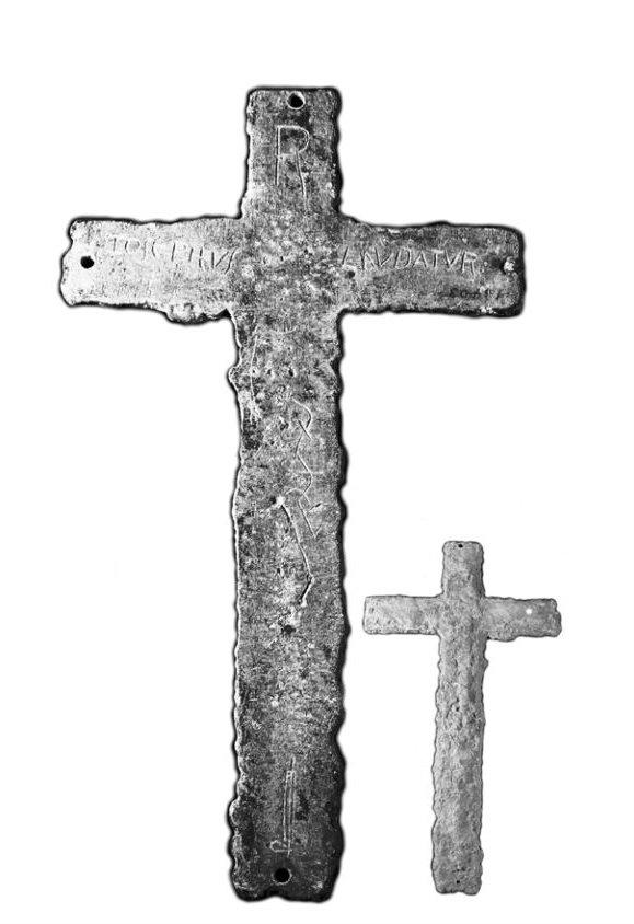 A lead cross, about 12 inches tall. The inscription reads, "A Roman. Joseph is praised."(Robert C. Hyde)