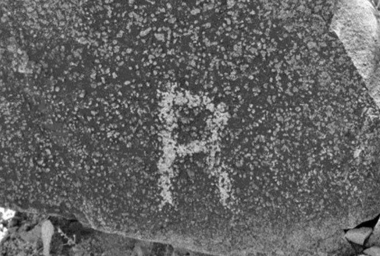 A petroglyph of a letter "R" found on Signal Hill. (Robert C. Hyde)