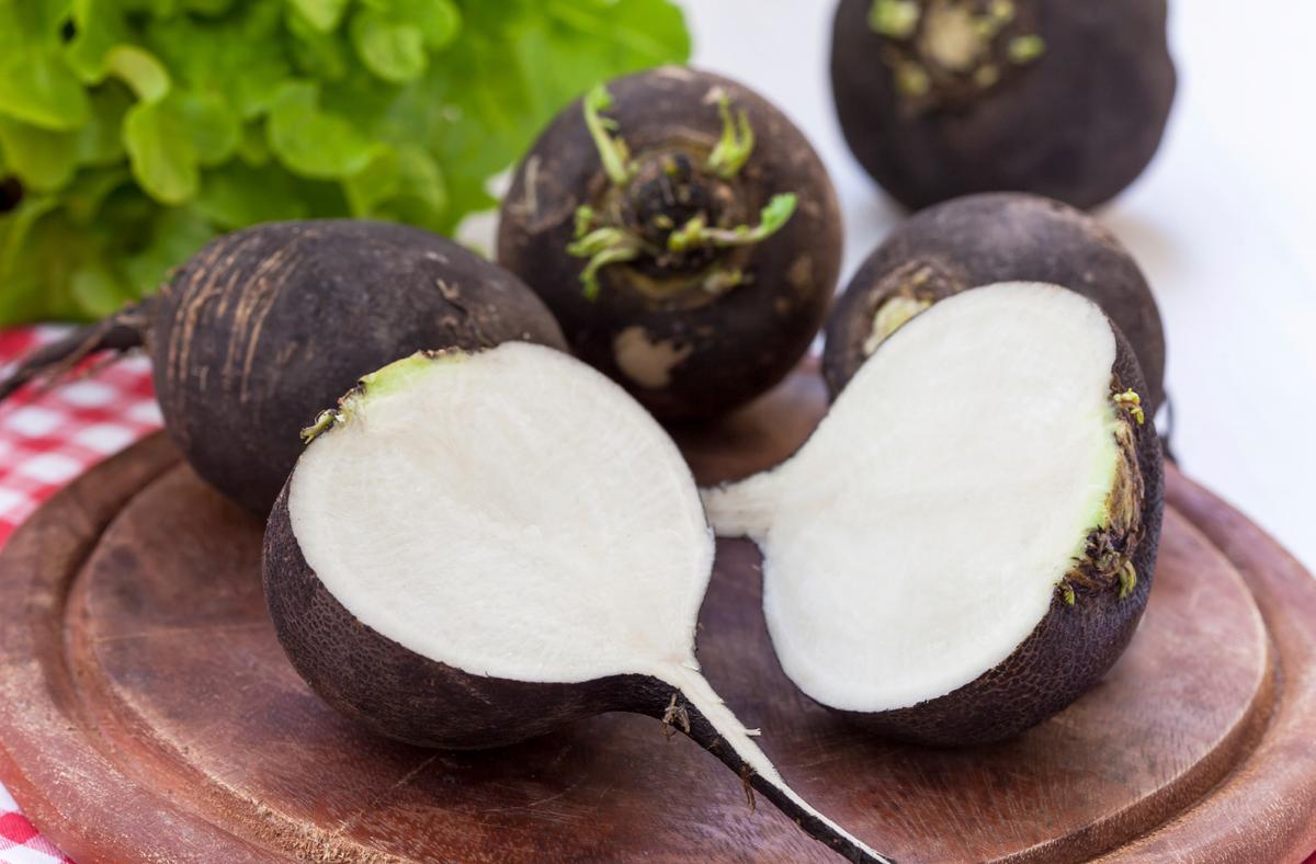 Black radishes have a tough black skin with a crunchy white flesh. (meteo021/iStock)