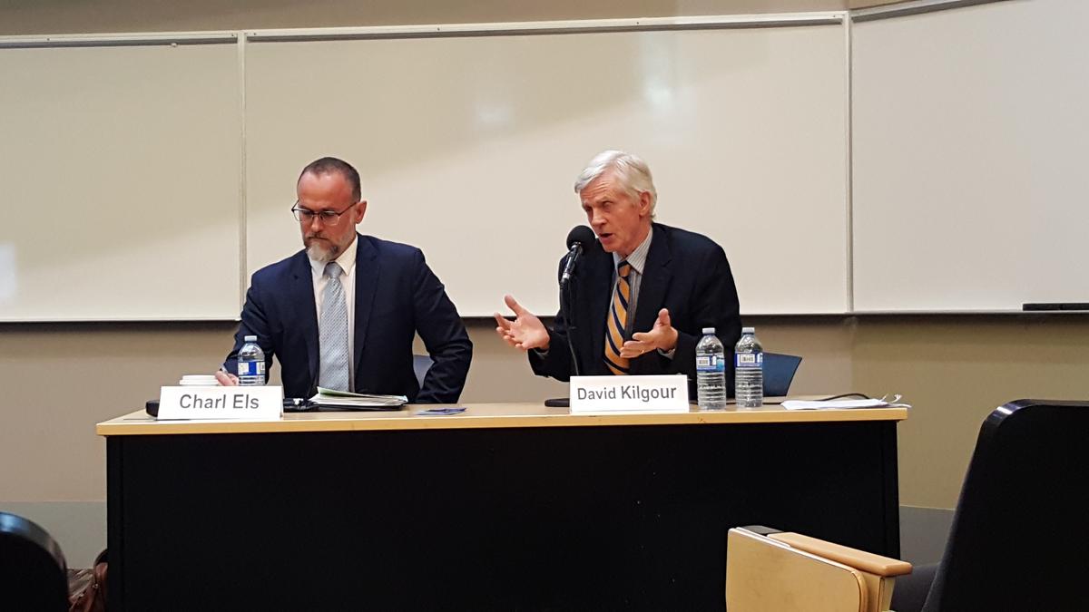 Dr. Charl Els (L), associate professor at the University of Alberta's department of psychiatry and the John Dossetor Health Ethics Centre, and David Kilgour, former Edmonton MP and secretary of state for Asia-Pacific, take part in a panel discussion following the screening of "Human Harvest" at the University of Alberta on April 28, 2016. (Shar Chen/Epoch Times)