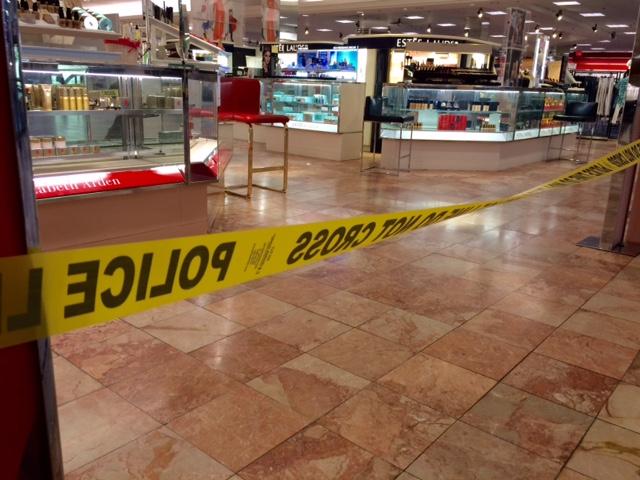 Crime scene tape is seen inside the Macy's at the Silver City Galleria mall in Taunton, Mass., Tuesday, May 10, 2016. Multiple people have been stabbed separate attacks at the mall and a home in Massachusetts. (Charles Winokoor/The Daily Gazette via AP)